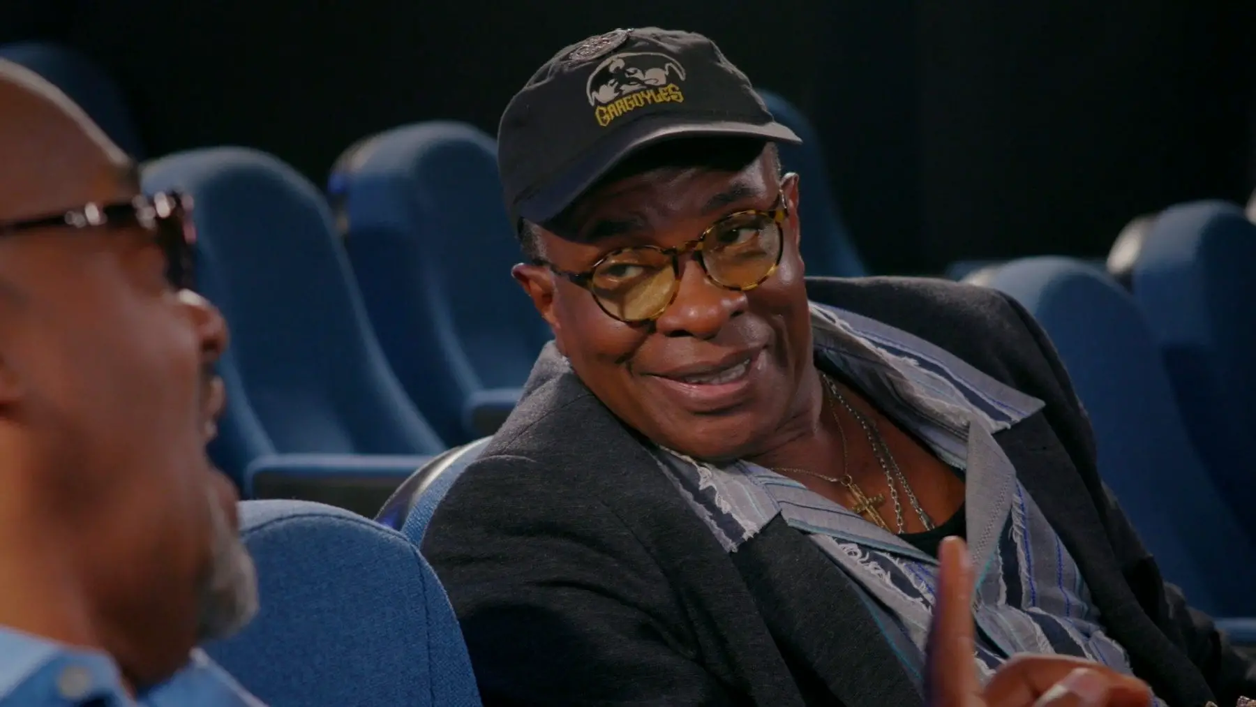 Keith David discussing his experiences in horror filmmaking in an empty theater.
