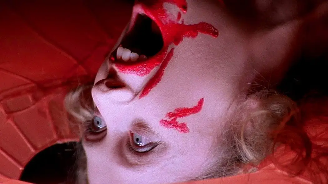 A girl is stalked and murdered in one of the most infamous opening scenes in horror history in Suspiria. 