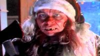 Larry Drake terrified as a serial killer Santa in Tales From The Crypt's And All Through The House.