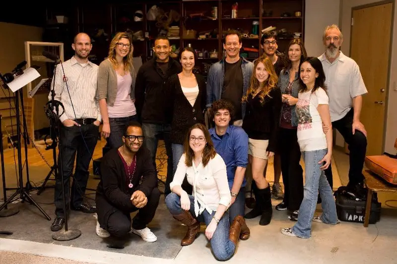 The Cast of We're Alive Season 1 in the recording studio for a posed picture