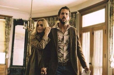 Married couple George and Kathy Lutz look around their new house in The Amityville Horror (2005).