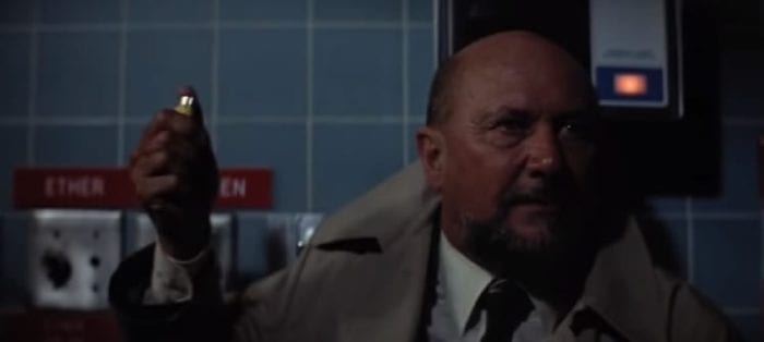 Dr Loomis sparks the lighter in a room full of explosive gases.