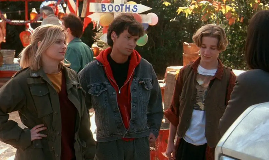 Tracy (Lezlie Deane), Carlos (Ricky Dean Logan), and Spencer (Breckin Meyer) attend a carnival of only adults in a scene from Freddy's Dead.