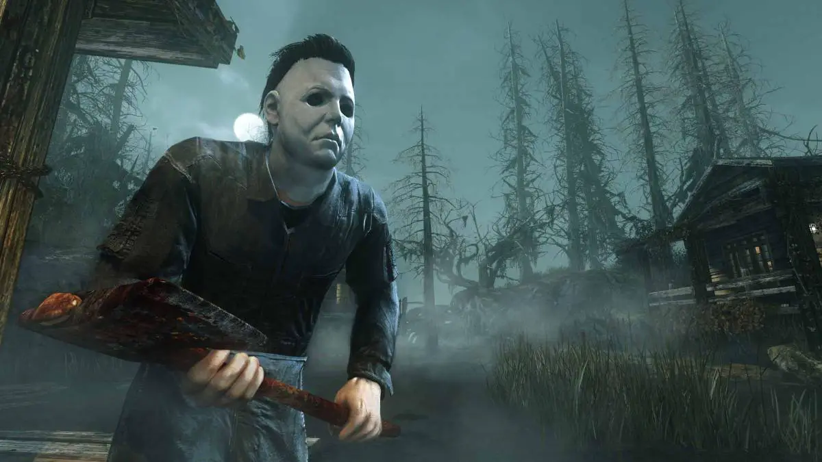 Michael Myers holding his axe in a fog filled dark wooded area