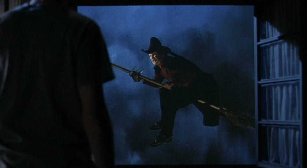 Freddy Krueger (Robert Englund) reenacting the Wicked Witch's tornado appearance from Wizard of Oz in Freddy's Dead.