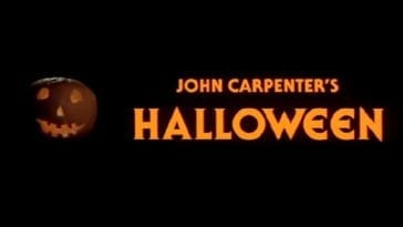 The Halloween title card "John Carpenter's Halloween" with a pumpkin to the left.
