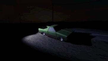 A car sits in pure darkness lit only by a single flash light.