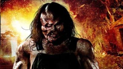 Victor Crowley character from Hatchet against flaming backdrop