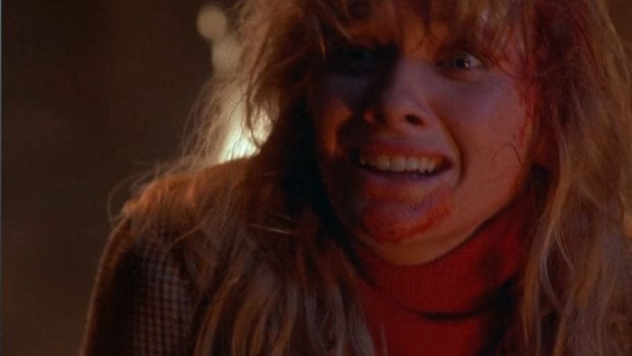 Barbara Crampton is staring wide-eyed at the end of From Beyond