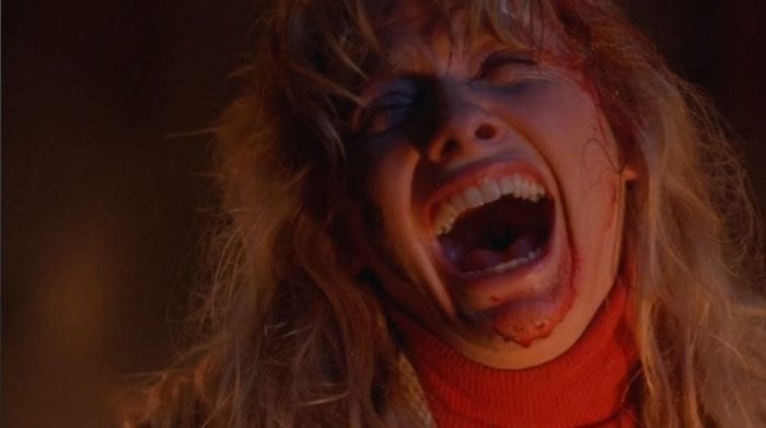 Barbara Crampton laughs maniacally at the end of From Beyond