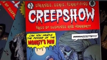 Cover of the Creepshow comic with text that reads "Can you handle to power of the monkeys paw" set before a full moon and skeletal corpes