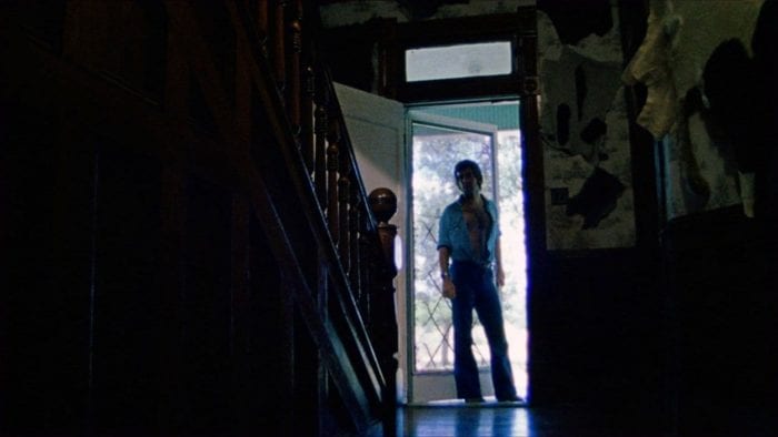 Kirk entering the farmhouse, from The Texas Chain Saw Massacre.