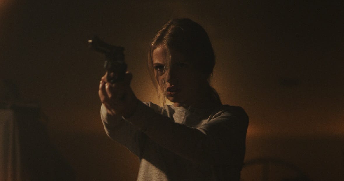 Olivia holdd and points the gun toward Charles and Aunt Beth.