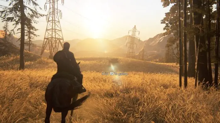 Character rides on horse in woods under powerlines.