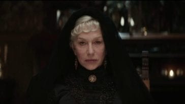 Sarah Winchester sits in a chair wearing black