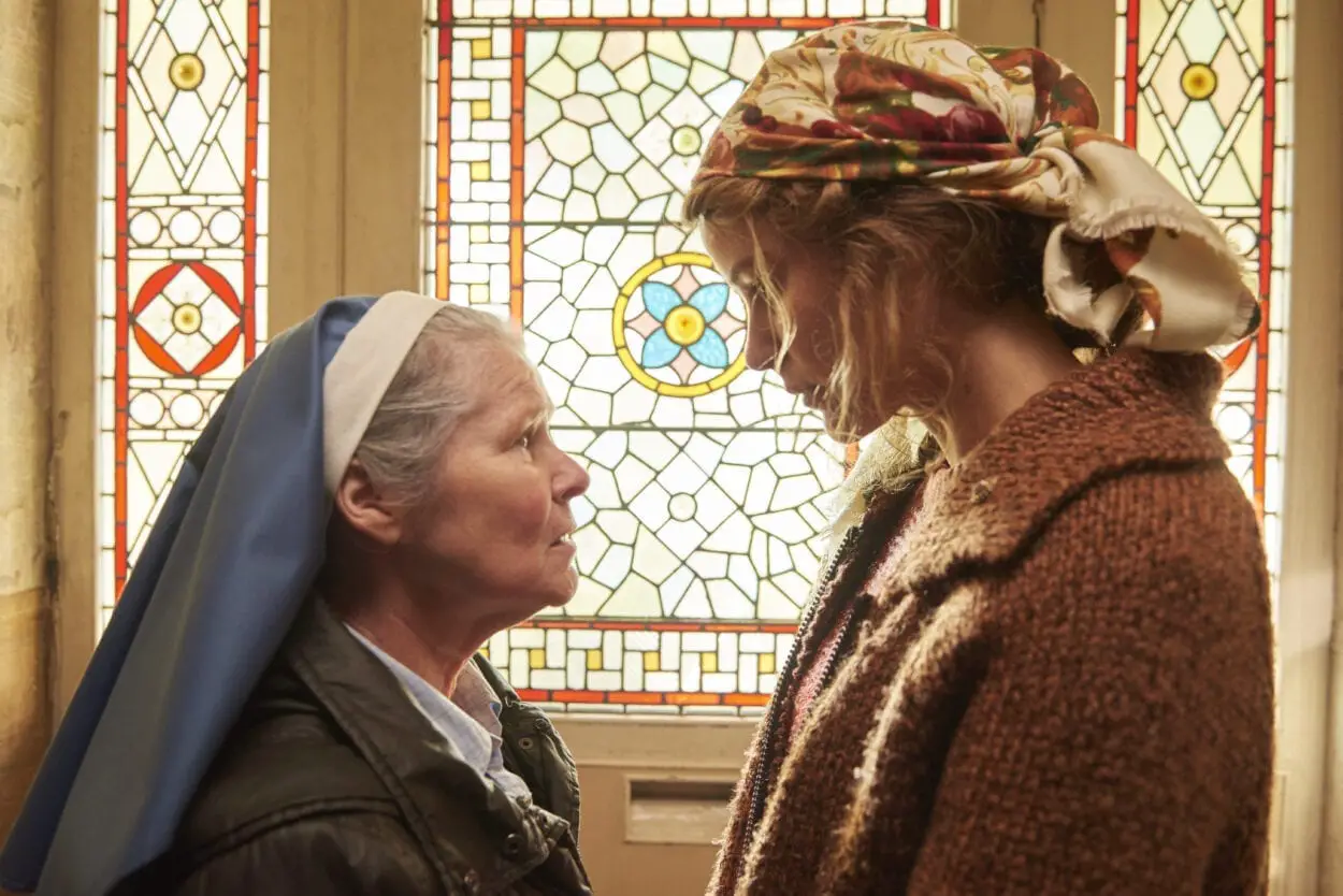 Sister Claire and Magda have a private chat.