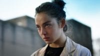 Justine, the main character in Raw, has blood dripping from her nose and stares menacingly