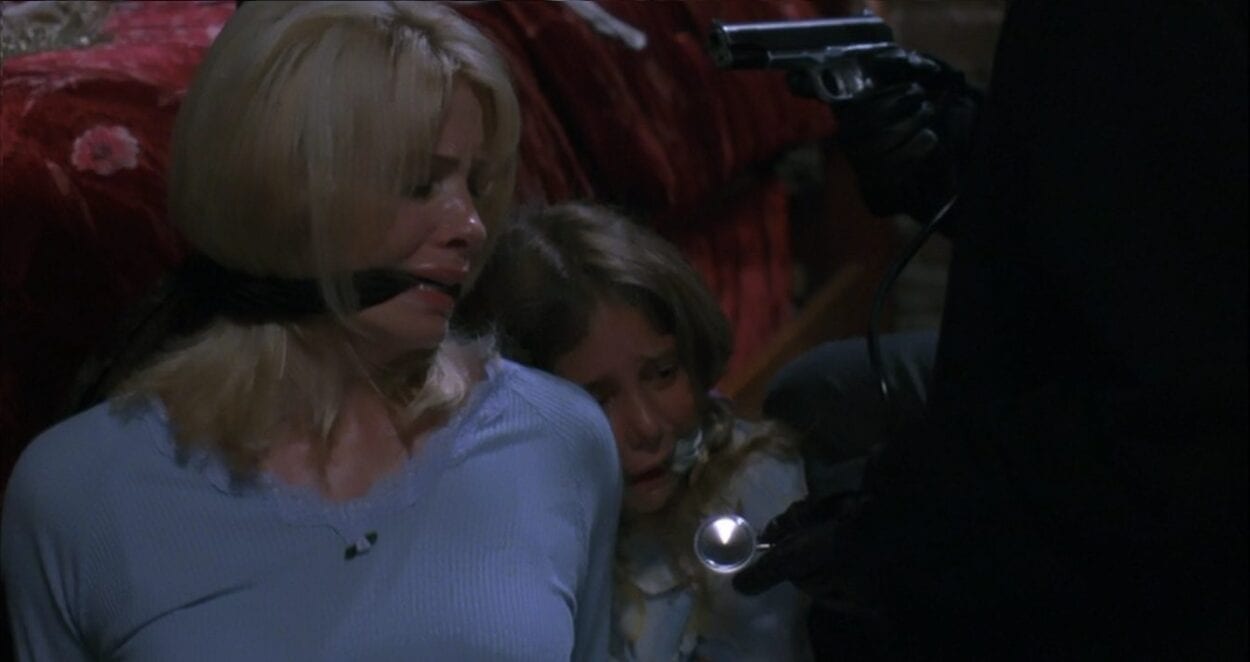 Alison and Diana Gordon held hostage/at gun-point by Zepp.