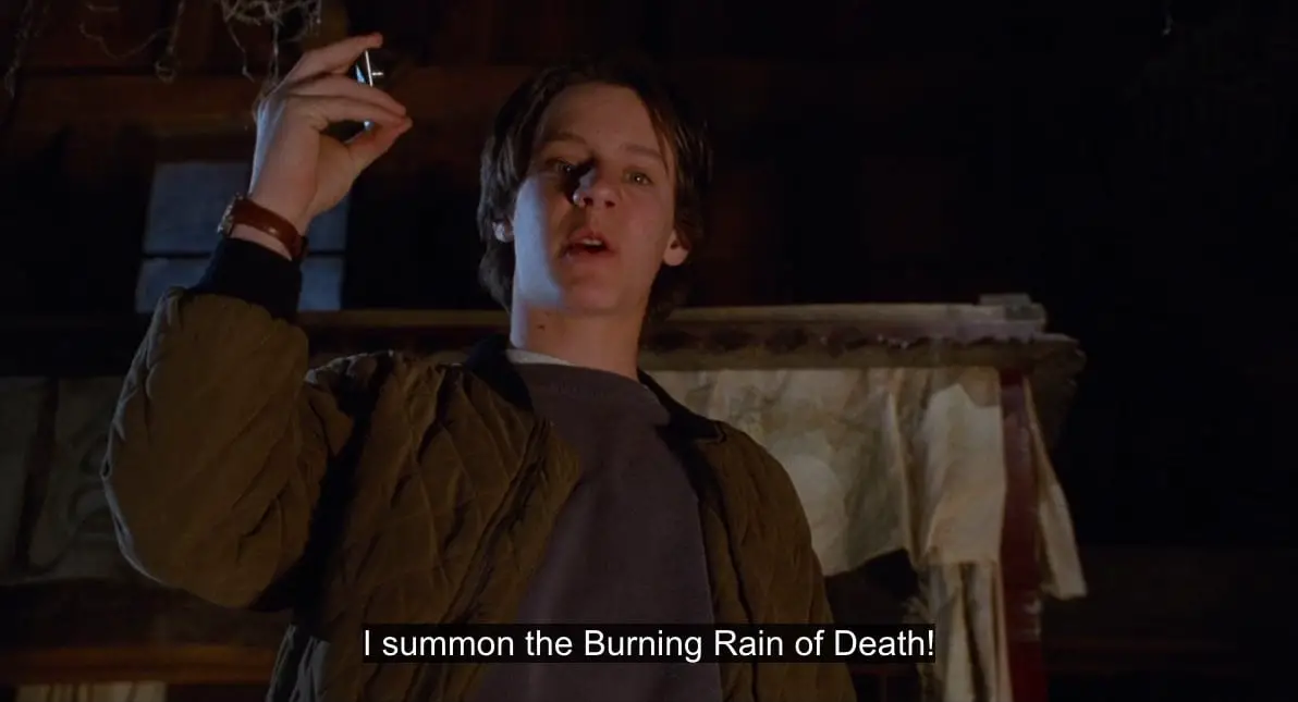 Max Dennison (Omri Katz) says, "I summon the Burning Rain of Death," before lighting a lighter next to a ceiling sprinkler, in the film, "Hocus Pocus" (1993).