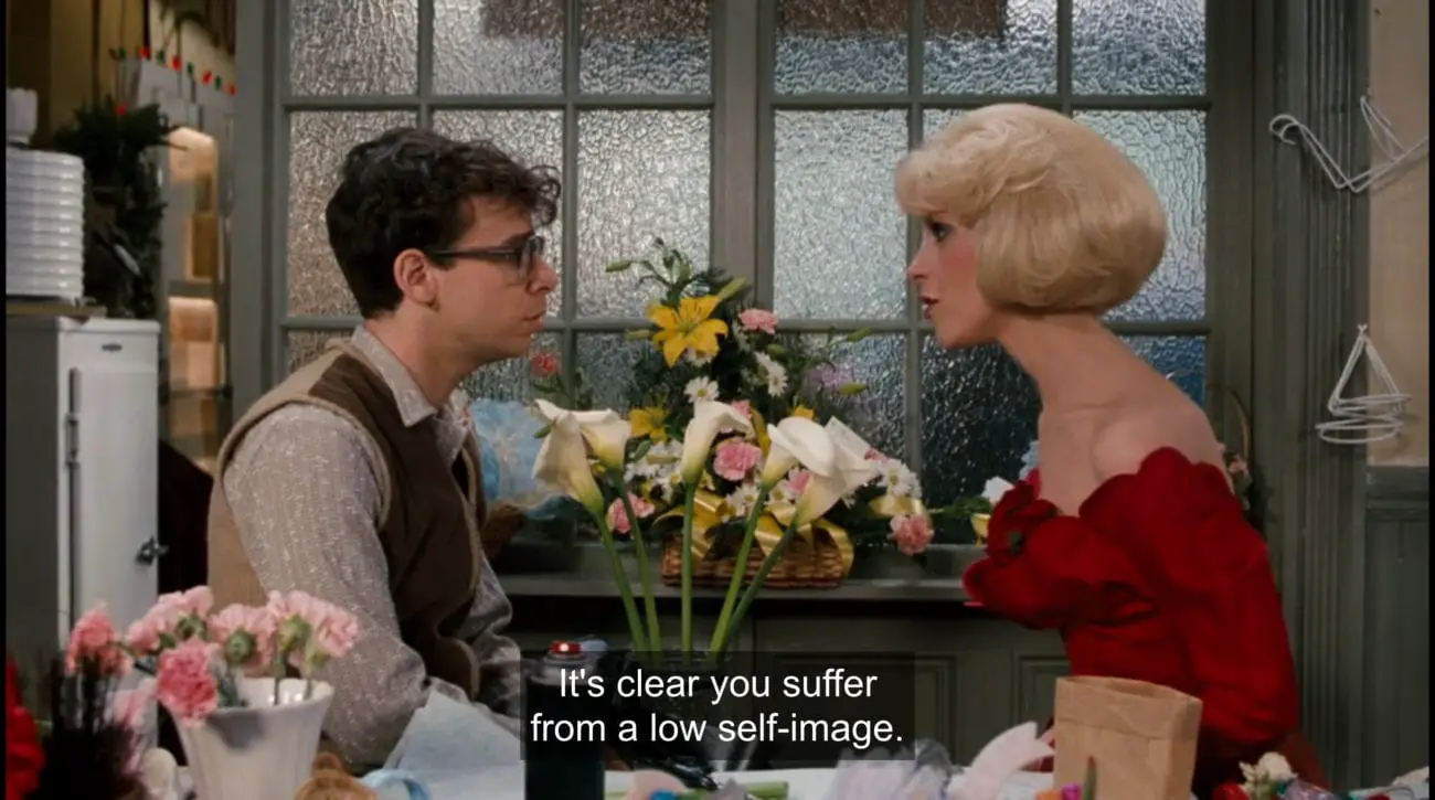 Audrey (Ellen Green) tells Seymour Krelborn (Rick Moranis), "It's clear you suffer from a low self-image," in the film, "Little Shop of Horrors" (1986).