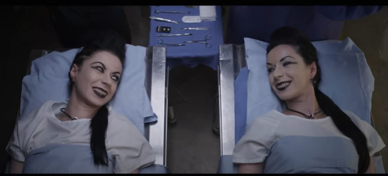 Soska sisters lie on hospital beds and smile at one another in American Mary.