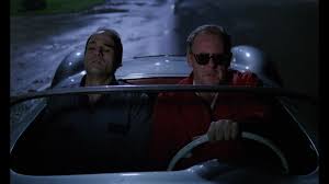 Vaughn and Seagrave reenact James Dean's crash.