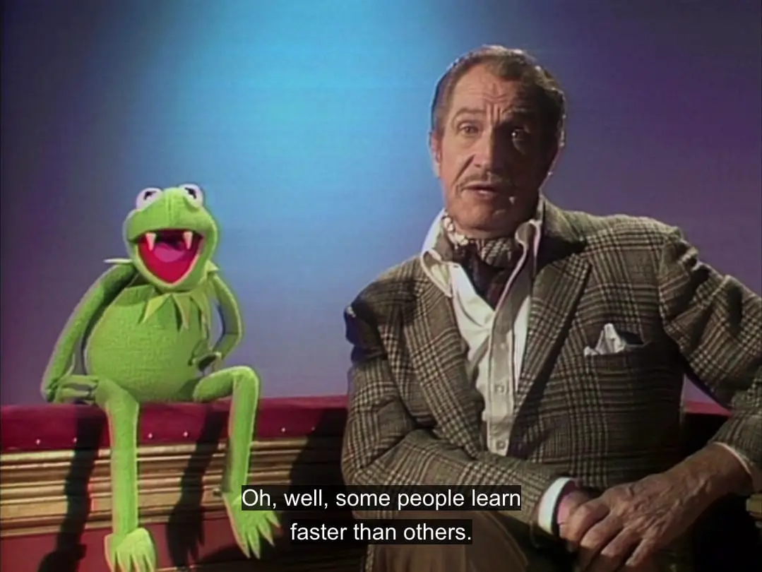 Vincent Price says, "Oh, well, some people learn faster than others," while Kermit the Frog sits next to him with vampire fangs, in the TV show, "The Muppet Show."