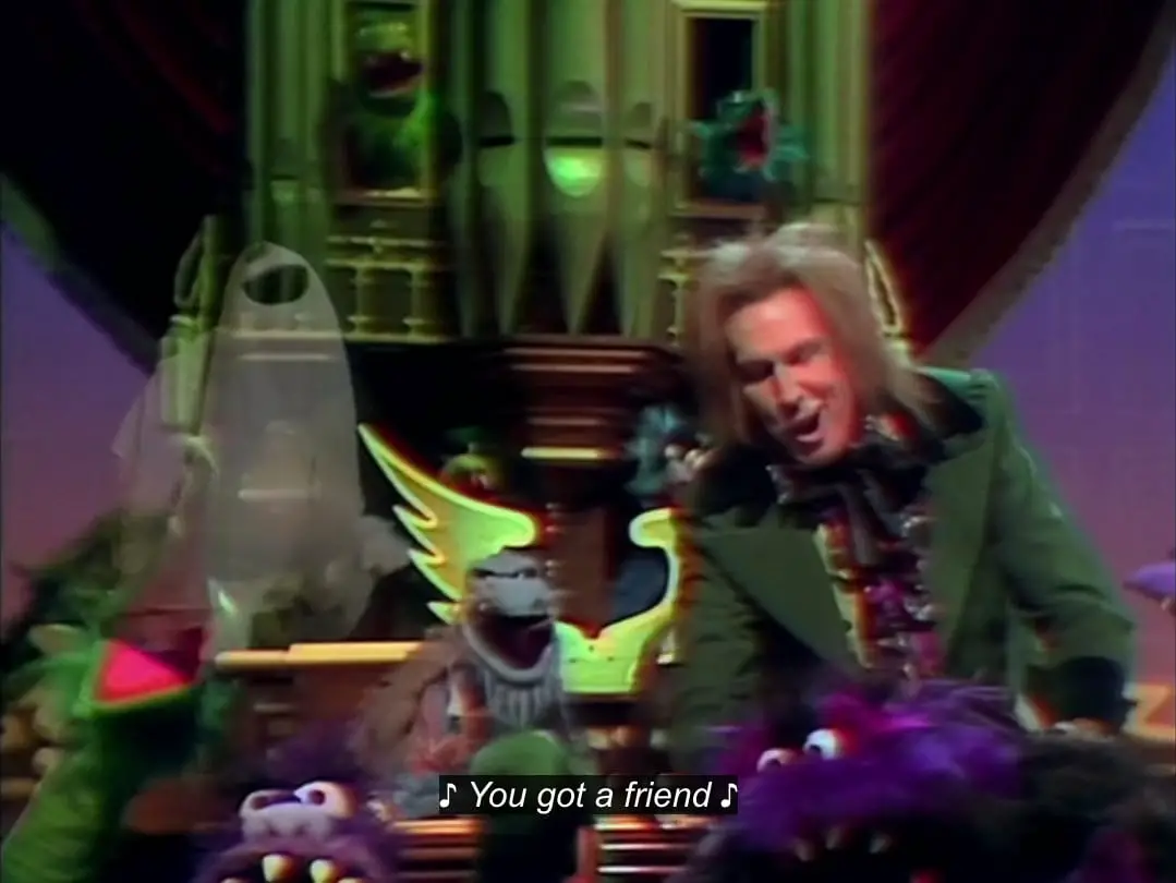 Vincent Price plays the organ while he, Uncle Deadly, a crew of Muppet monsters, and a ghost sing, "You've Got a Friend," in the TV show, "The Muppet Show."
