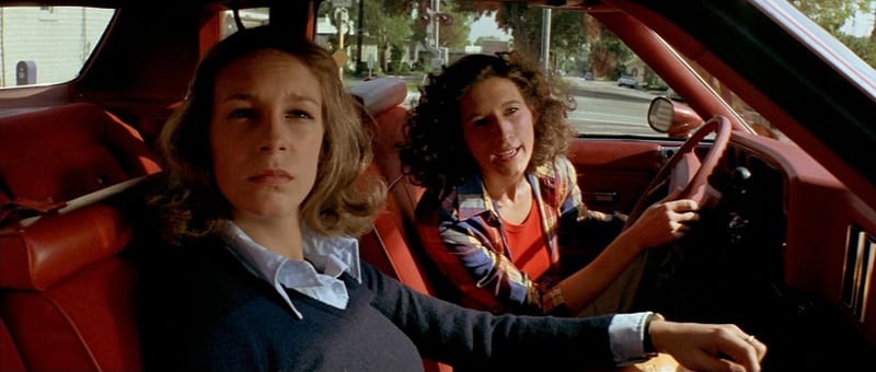 Annie Brackett and Laurie Strode sit in Annie's car in Halloween.