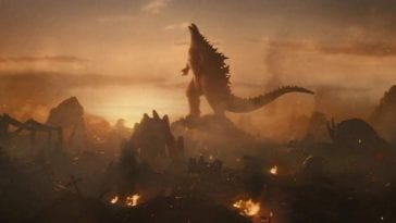 A triumphant Godzilla surrounded by other titans