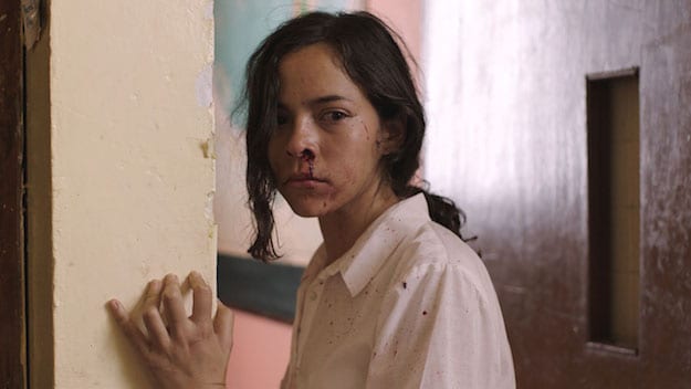 Alejandra (Ruth Ramos) in a state of shock after fighting with her husband Angel. 