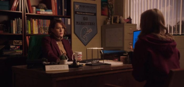 School counselor Mrs. Porter (Molly Ringwald) listens to Lola Pierce (Maddie Nichols) tell her story, from the TV show, "Creepshow."