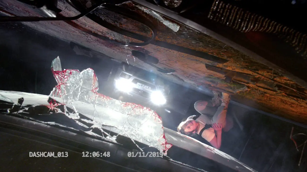 Eliza Nicholls as Linda checking a crashed car for people inside
