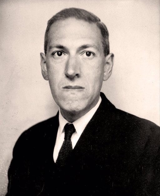 An old photograph of H.P. Lovecraft in a suit