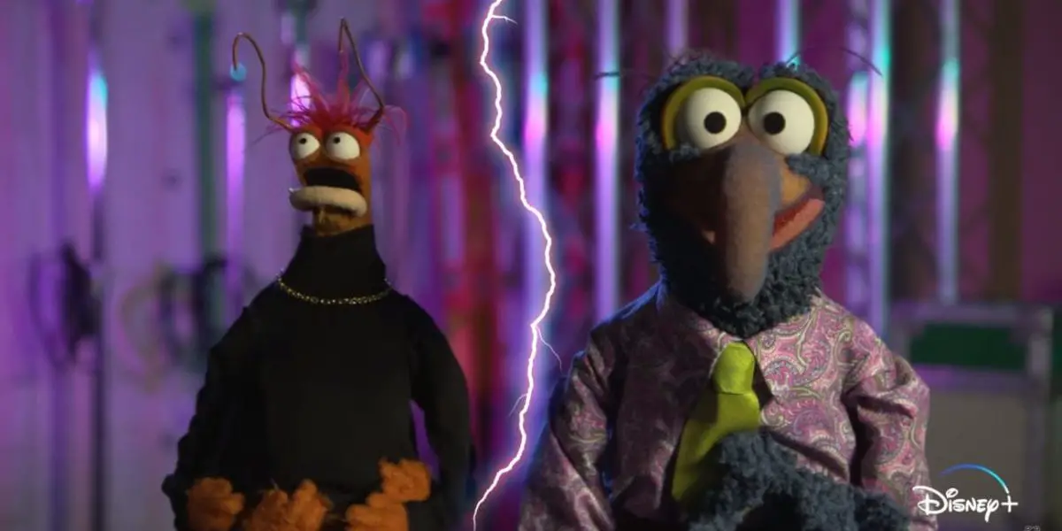 Pepé the King Prawn looks up in awe at spontaneous lightning while standing next to Gonzo the Great, who's announcing the premiere of, "Muppets Haunted Mansion" on Disney+.