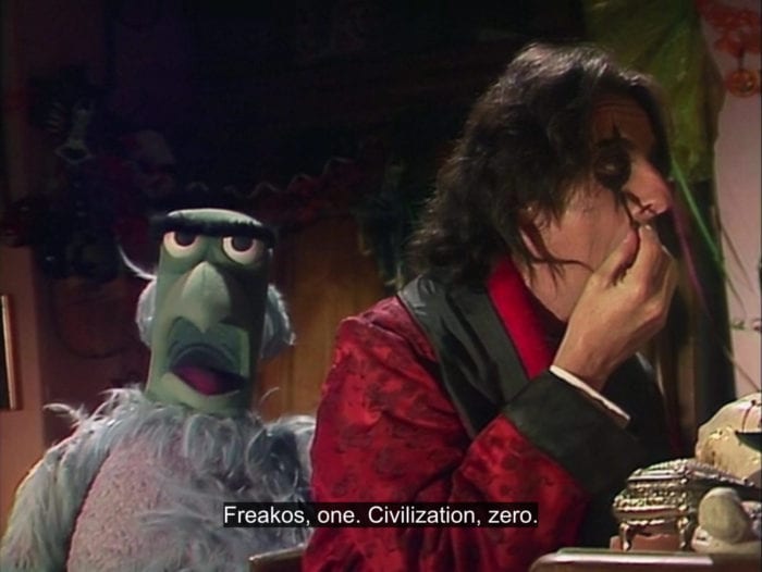 Sam the Eagle says, "Freakos, one. Civilization, zero," while standing next to Alice Cooper, in the TV show, "The Muppet Show."