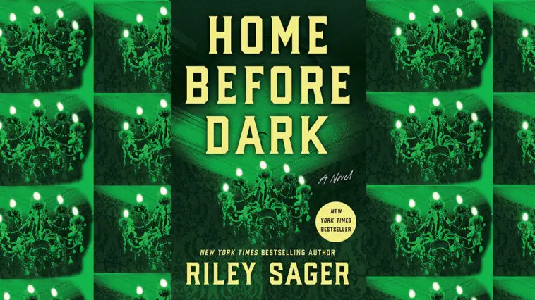 Home before dark book cover with picture of chandelier cast in green light.