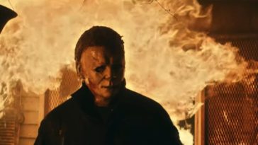 Michael Myers walks out of a fire engulfed house.