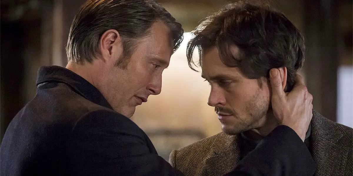 Hannibal and Will in an embrace.