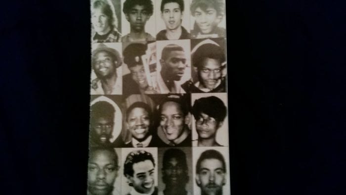 A page of black and white headshots of young men.
