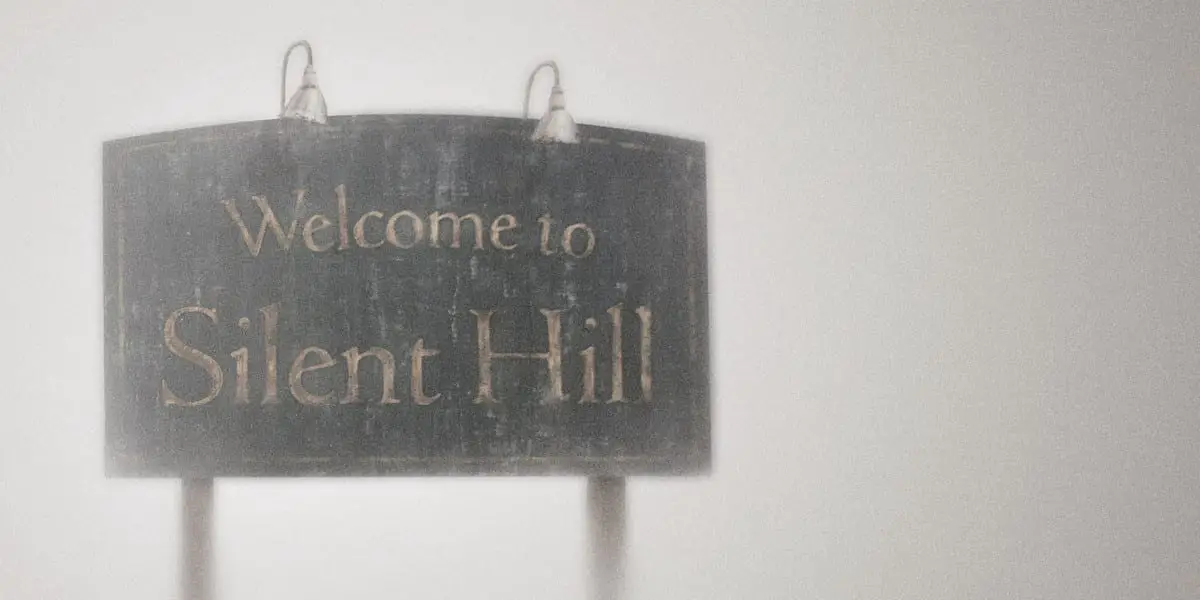 The Silent Hill sign surrounded by fog and mist.