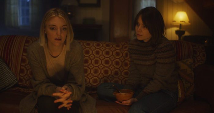 Two girls having a conversation.