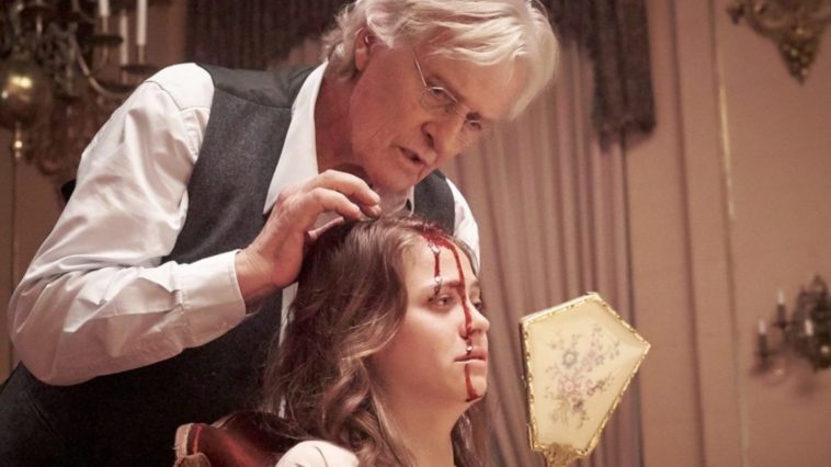 Joseph Peach (Rutger Hauer) performs an operation on Alice to rid her of schizophrenia