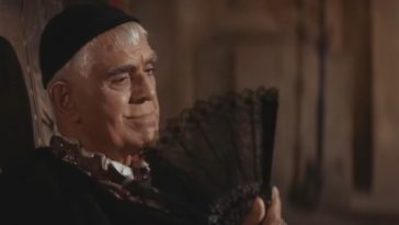 Boris Karloff fanning himself in The Raven