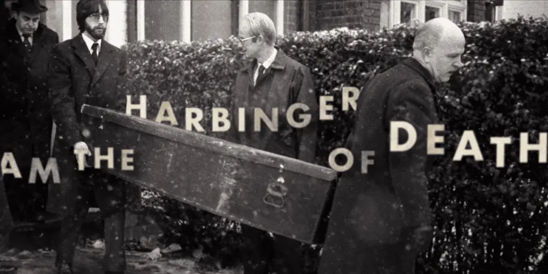 screencap of Dennis Nielsen documentary depicting pallbearers carrying a coffin with the words "I am the harbinger of death" overlaid.