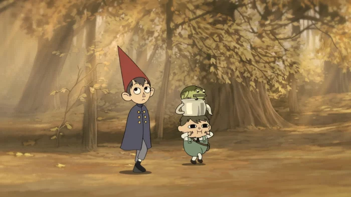 Two brothers are walking through a forest, one taller than the other. The taller one is wearing a pointed red hat while the smaller one has an upside down teapot and a frog on his head.