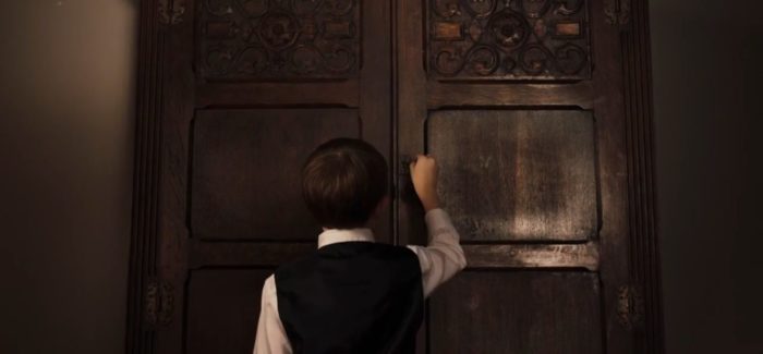 Young Tim unlocks the armoire in Time Out
