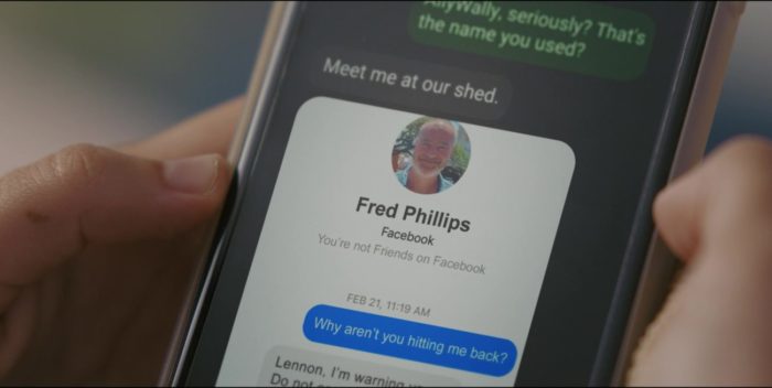 a phone showing a Facebook Messenger communication with a man named Fred Phillips