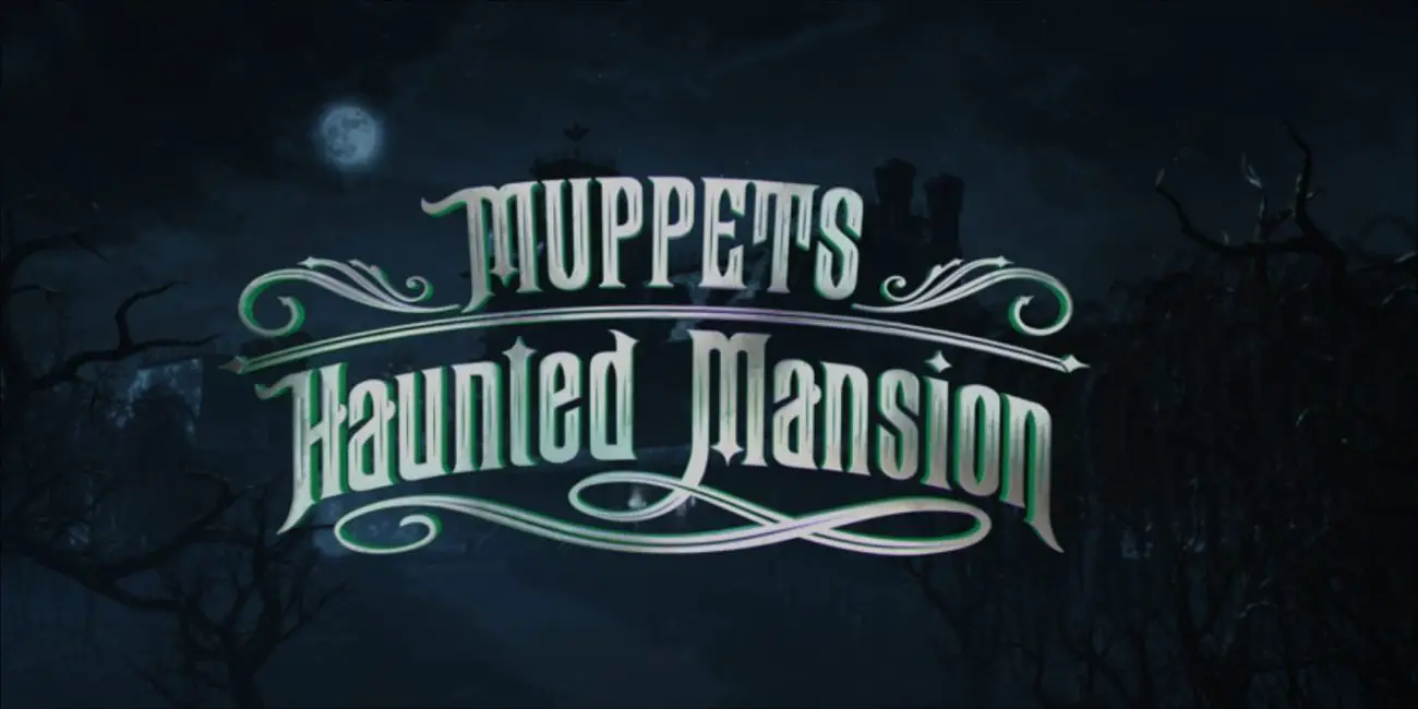 Muppet bats fly by during the full moon in front of the title card for the 2021 special, "Muppets Haunted Mansion."