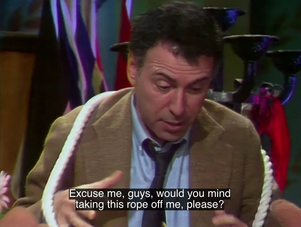 Alan Arkin, tied up, asks, "Excuse me, guys, would you mind taking this rope off me, please?", from the TV show, "The Muppet Show."